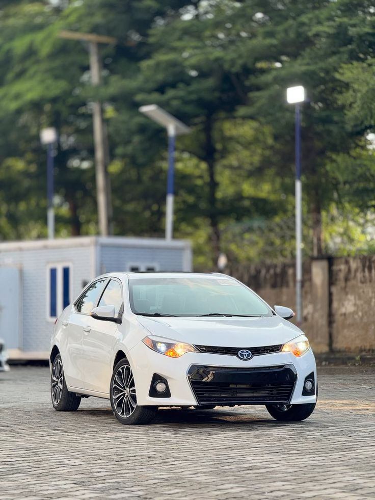 White Toyota Corolla sold by TRUST ZENNIA LTD in Nigeria